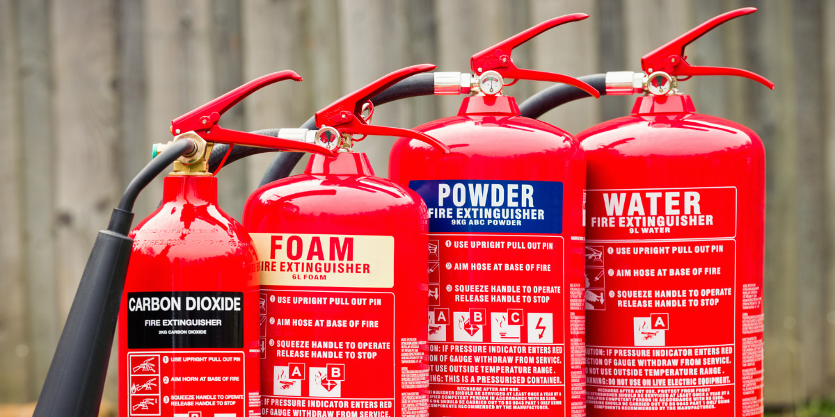 An image of fire extinguishers by Melwood Facilities